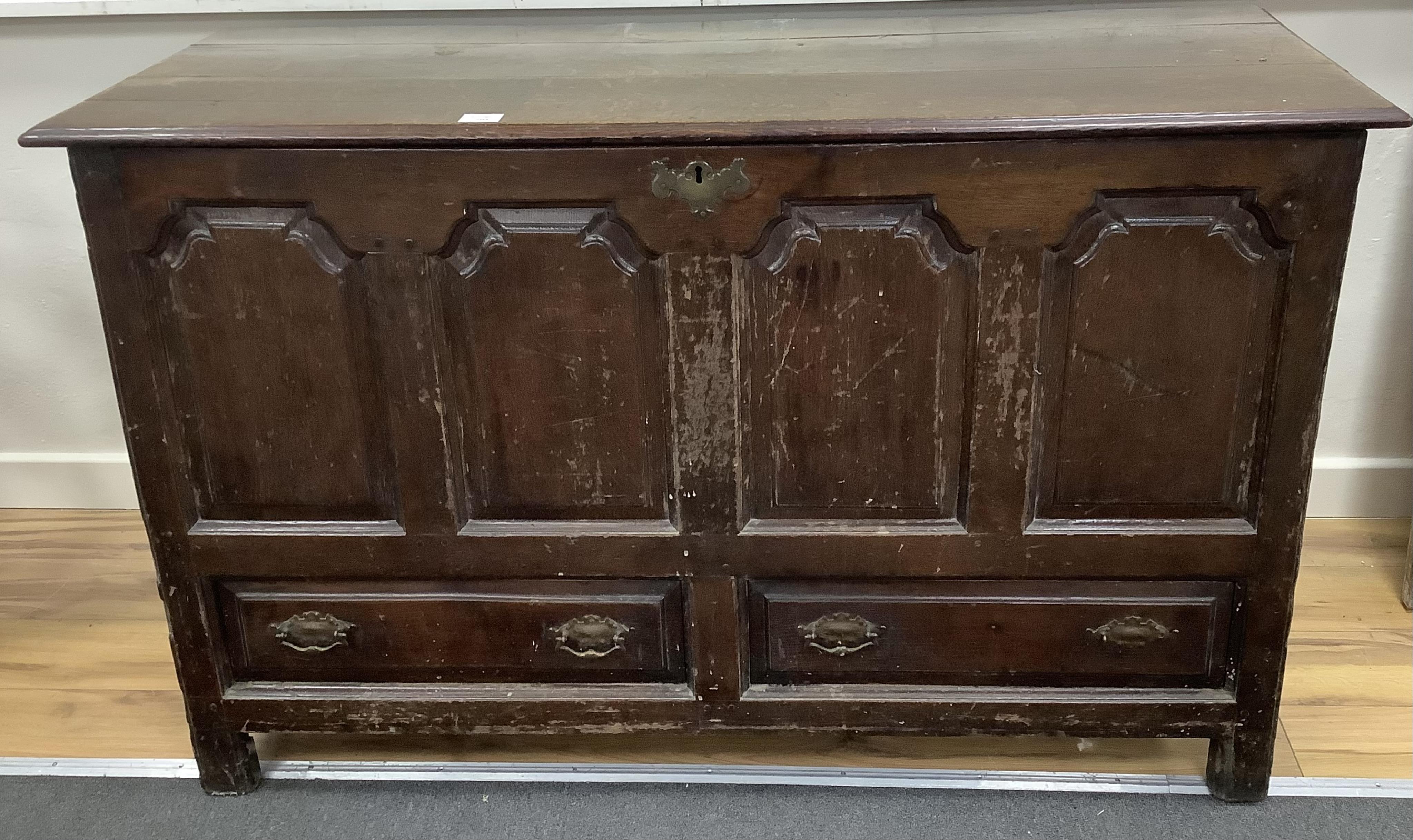 A mid 18th century North Wales oak mule chest, width 136cm, depth 53cm, height 84cm. Condition - poor